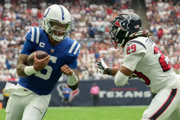 Sep 17, 2023; Houston, Texas, USA; Houston Texans safety M.J. Stewart (29) tries to tackle Indianapolis Colts quarterback Anthony Richardson (5) as he rushes in a touchdown Sunday, Sept. 17, 2023, during a game against the Houston Texans at NRG Stadium. Mandatory Credit: Jenna Watson-USA TODAY Sports